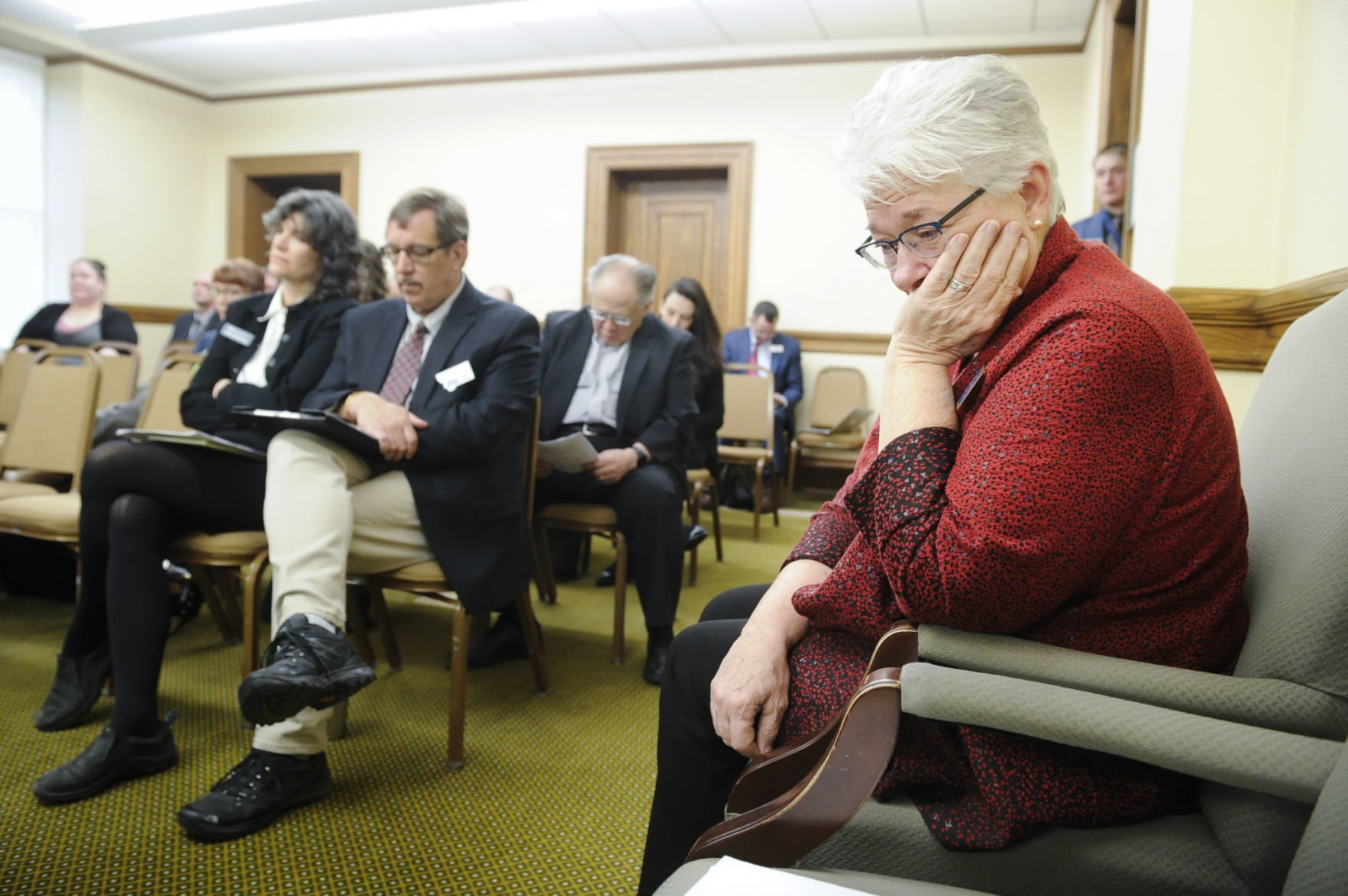 Sen. Diane Sands, D-Missoula, hangs her head